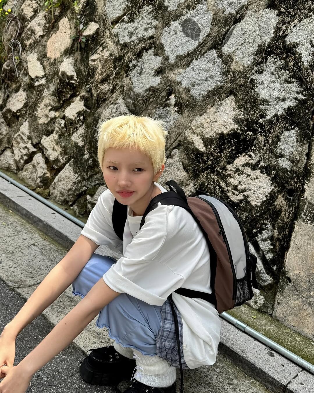 Soyeon with short blonde hair