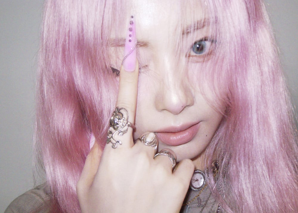 Fans Applaud TWICE's New Concept Featuring Tzuyu’s Pink Hair and the Group’s Striking Visuals 4 TWICE Concept Photo 4