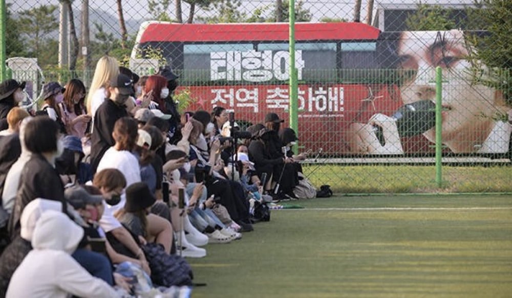 RM and V at their military discharge event in Chuncheon