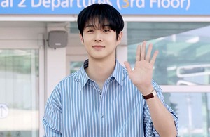 Boyfriend Look King Choi Woo-shik Turns Heads on His Way to Paris