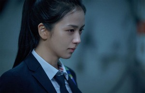 Jisoo Suits Up in School Uniform with Fierce Charisma — ‘Omniscient Reader’ Still Cuts Unveiled