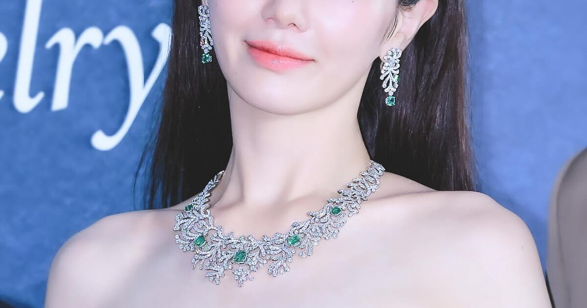 "Squid Game" Actress Shows Off Petite Figure In Bold, Cleavage-Revealing Dress