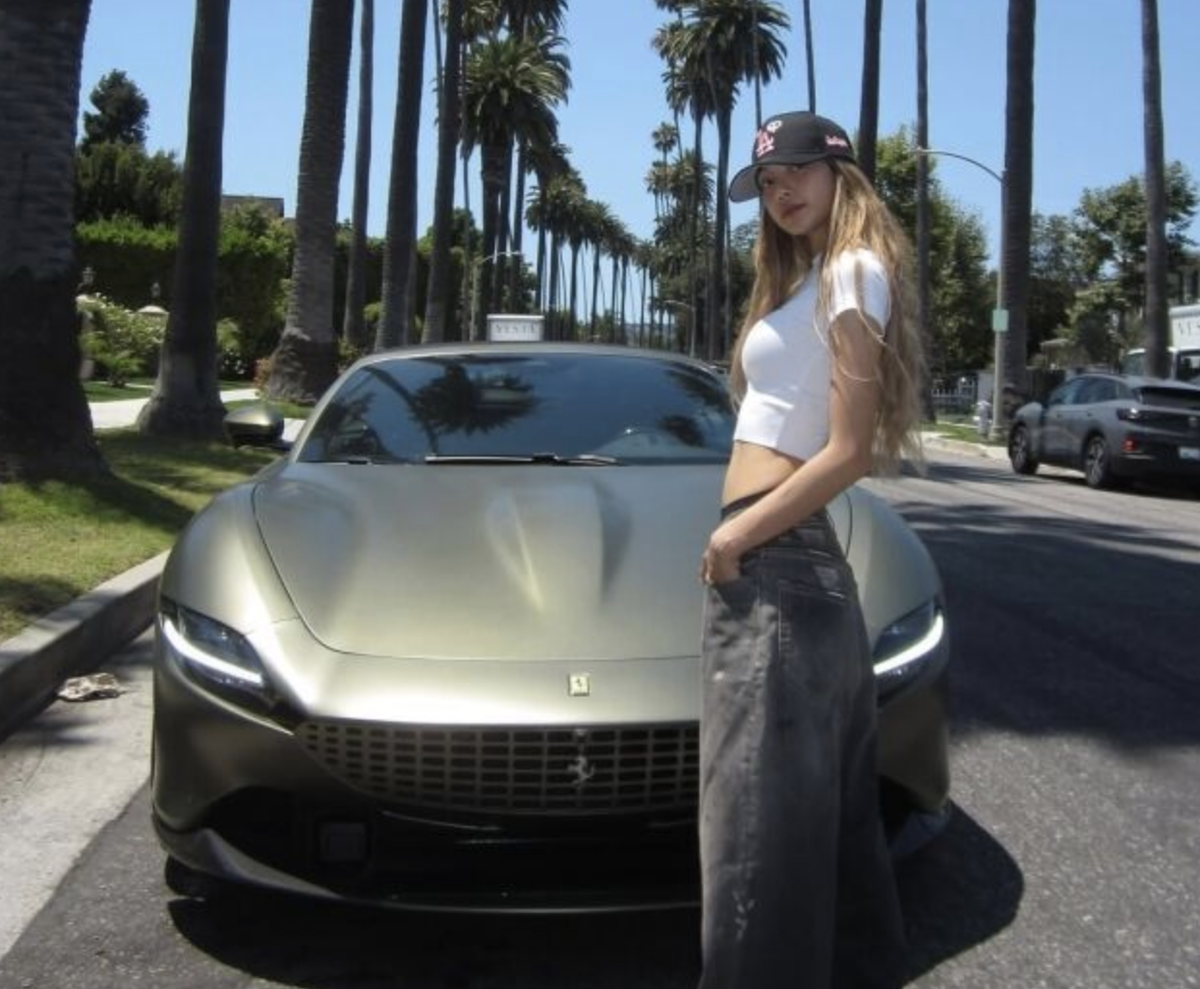 BLACKPINK's Lisa turns heads with high-end Ferrari and sleek fashion