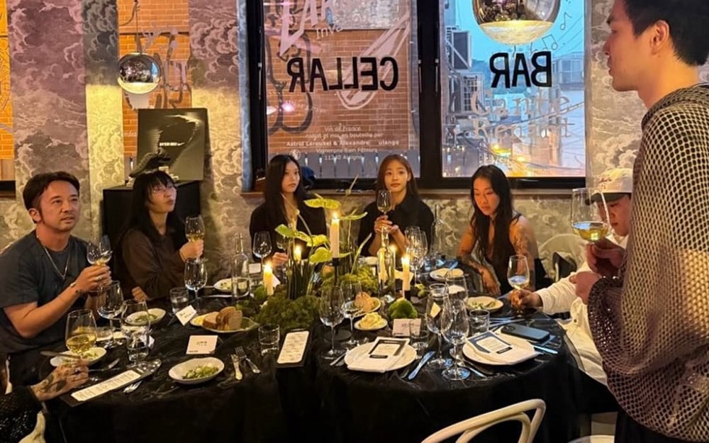 Photo of NewJeans at dinner with wine glasses sparks heated online debate amid antidepressant medication claims