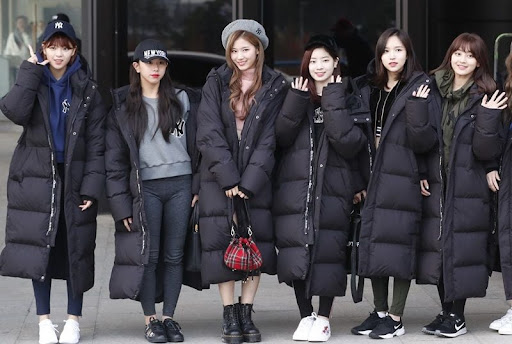 TWICE in long puffer jackets