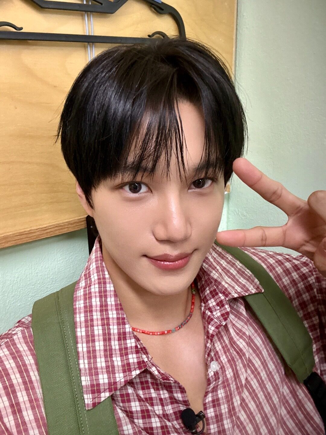 Kai with Chrome Hearts necklace