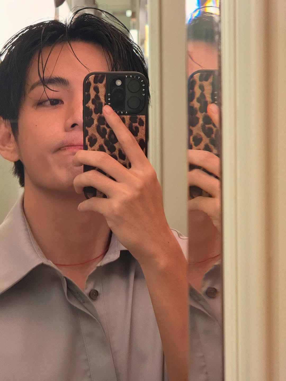 BTS’s V holding flowers