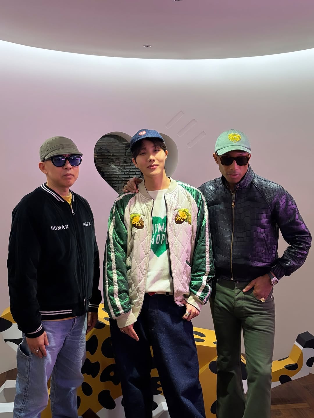 J-Hope and Pharrell close-up