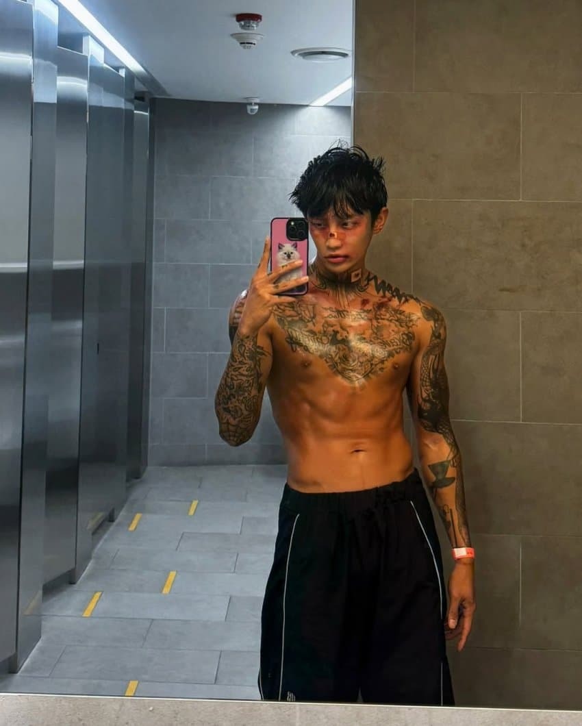 Nana shirtless tattooed