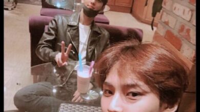 Photo of Cha Eunwoo and Mingyu with caption joking about tax evasion