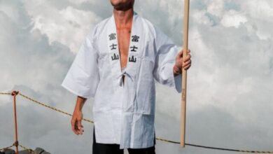 Diplo holding Rising Sun flag